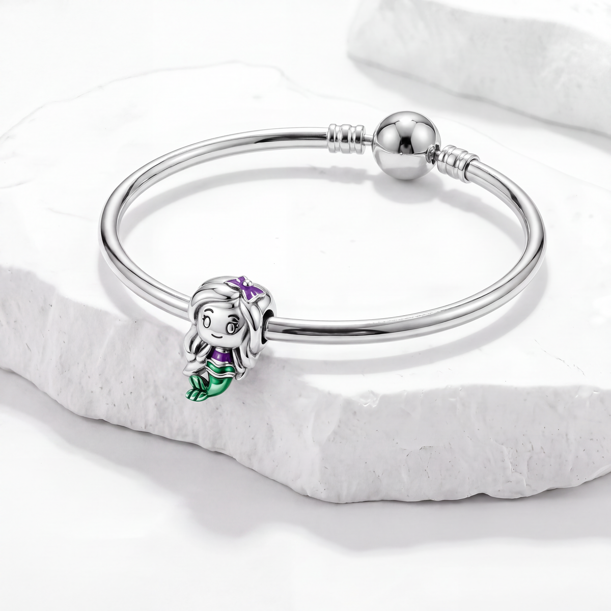 Ariel charm on a silver bracelet from the Little Mermaid Disney charms collection, showcasing vibrant colors.