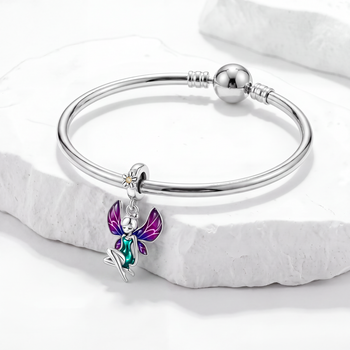 Tinker Bell charm on a silver bracelet, perfect for Disney charms lovers who believe in magic and fairies.