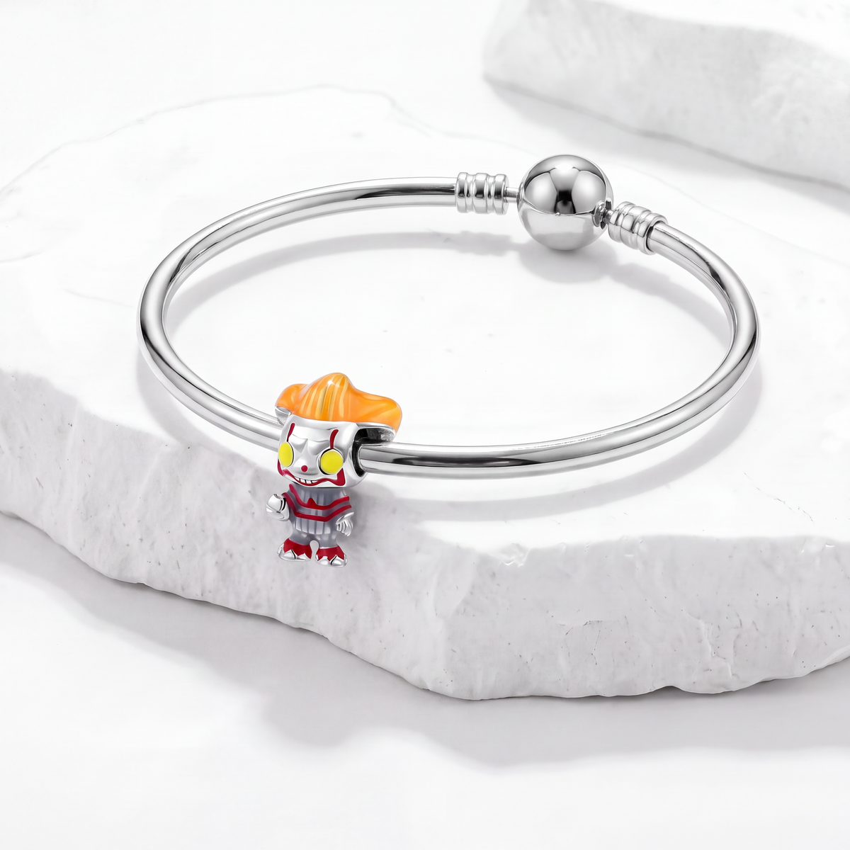 Halloween charms bracelet featuring a playful clown pendant with vibrant colors, perfect for a spooky style.