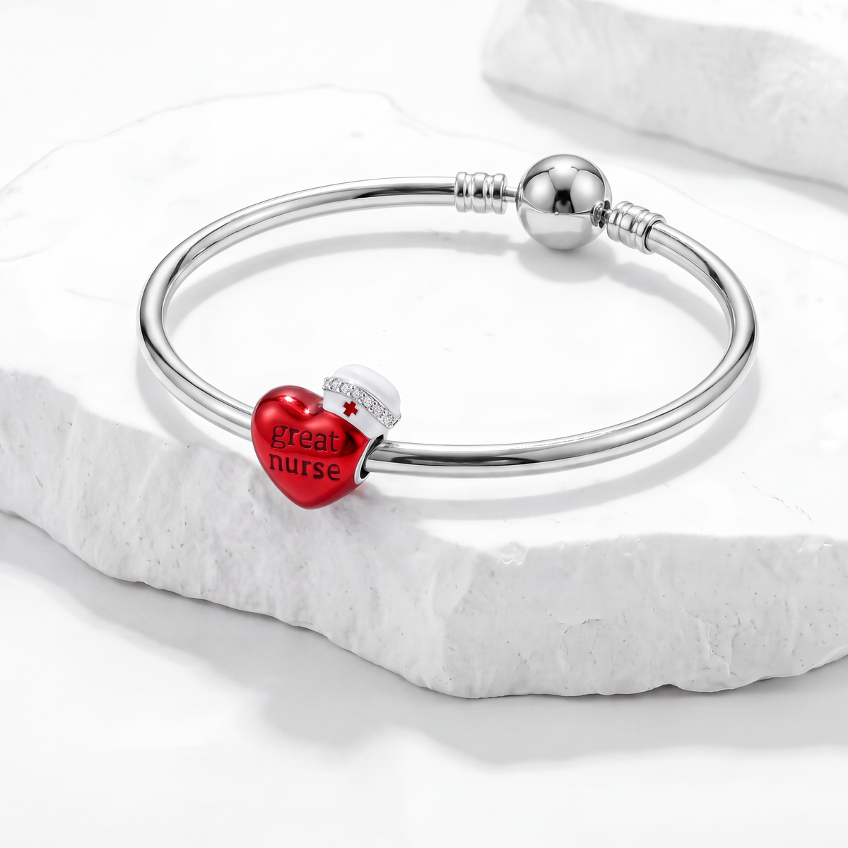Occupation Charms featuring a red heart charm that reads 'great nurse' on a silver bracelet.