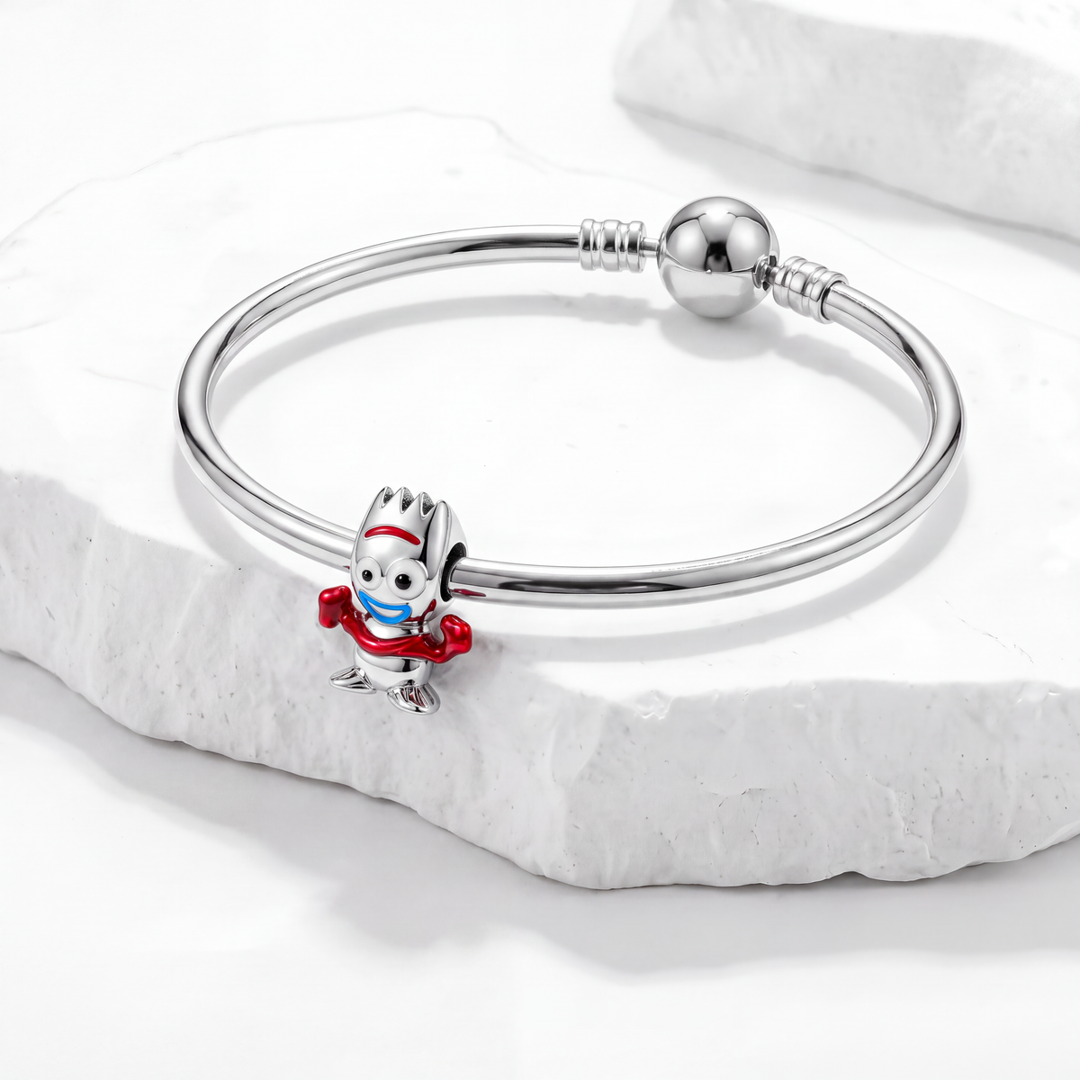 Disney charms featuring Forky charm on a silver bracelet, celebrating the magic of Toy Story.