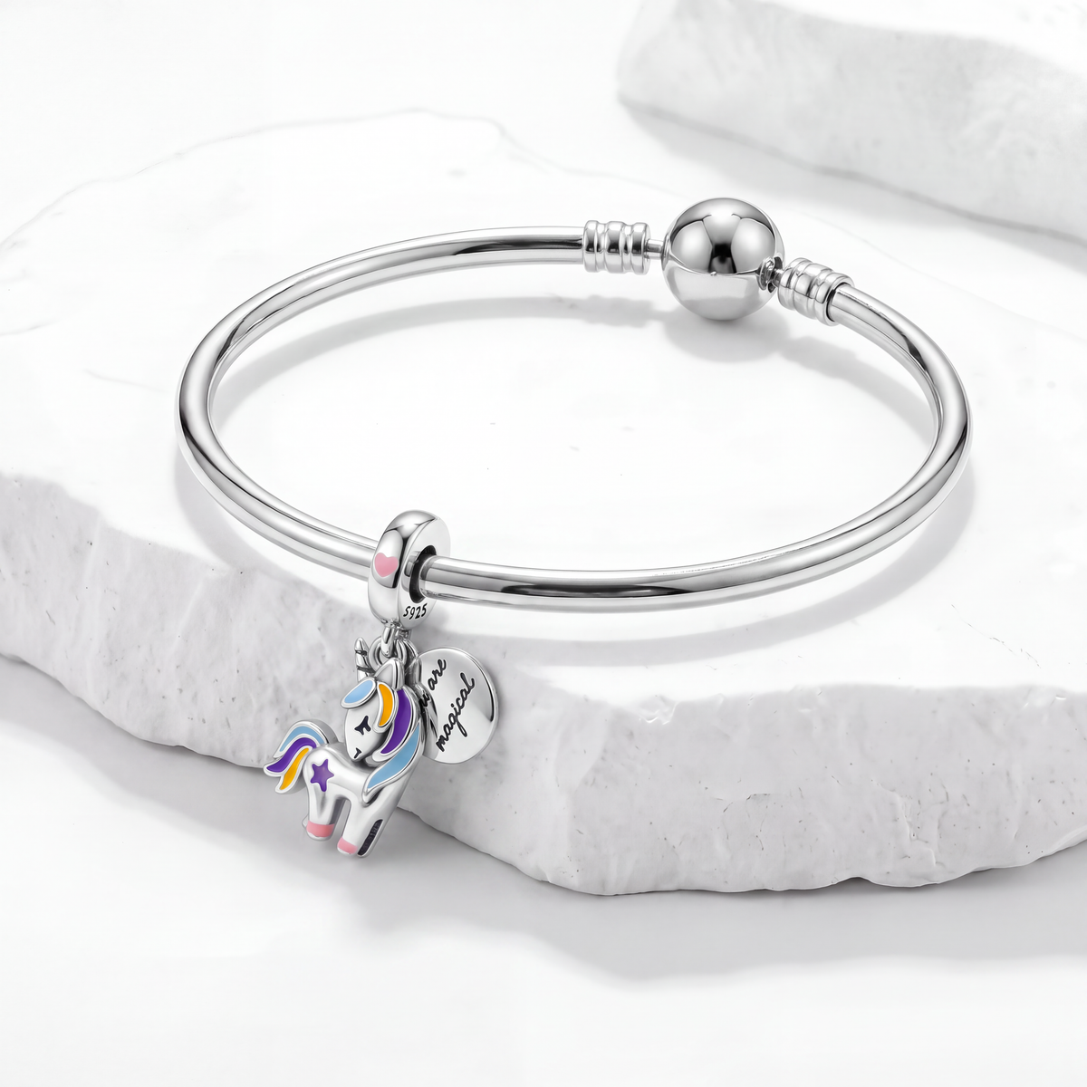 Colour Change Charms featuring a colorful unicorn charm on a silver bracelet with a magical quote tag.