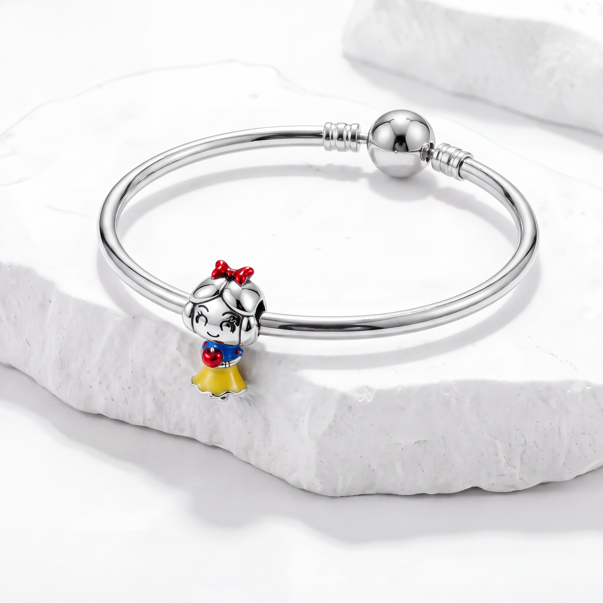 Snow White charm on a silver bracelet, part of our Disney charms collection, symbolizing friendship and magic.