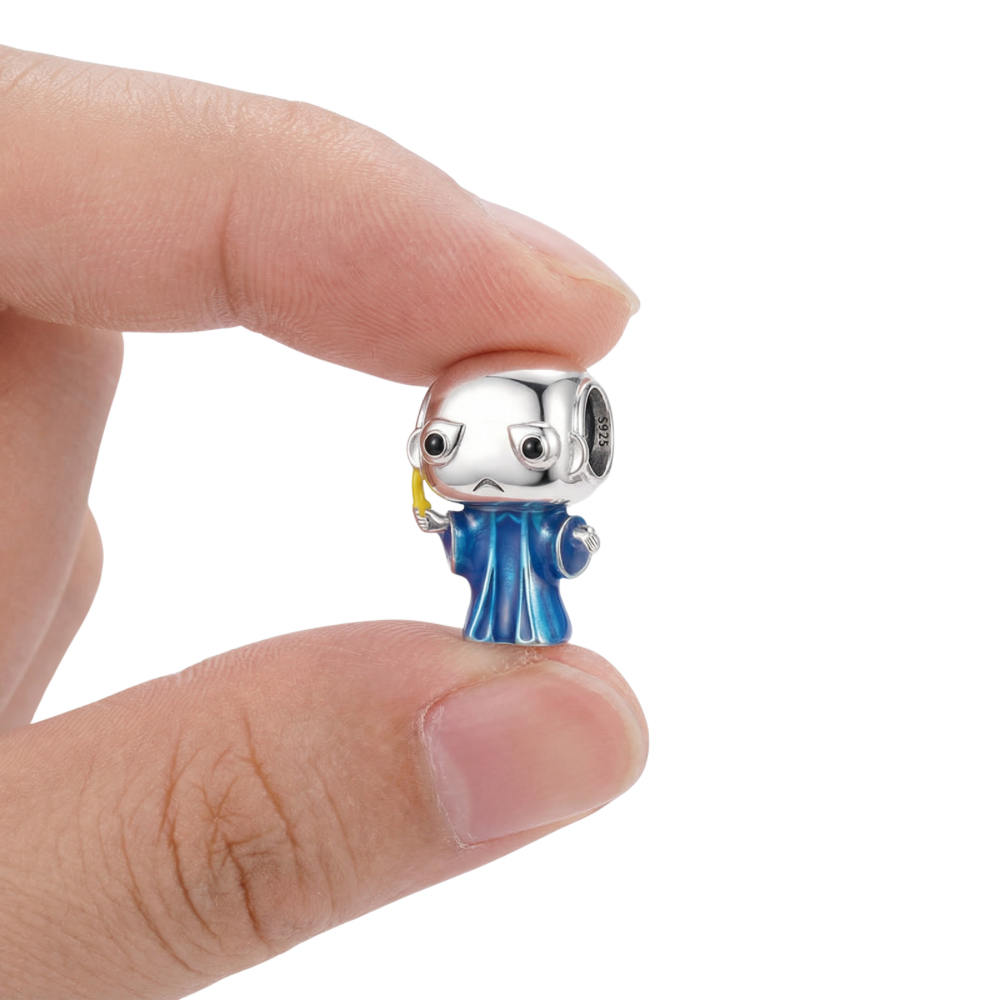 Harry Potter Lord Voldemort Charm being held between fingers
