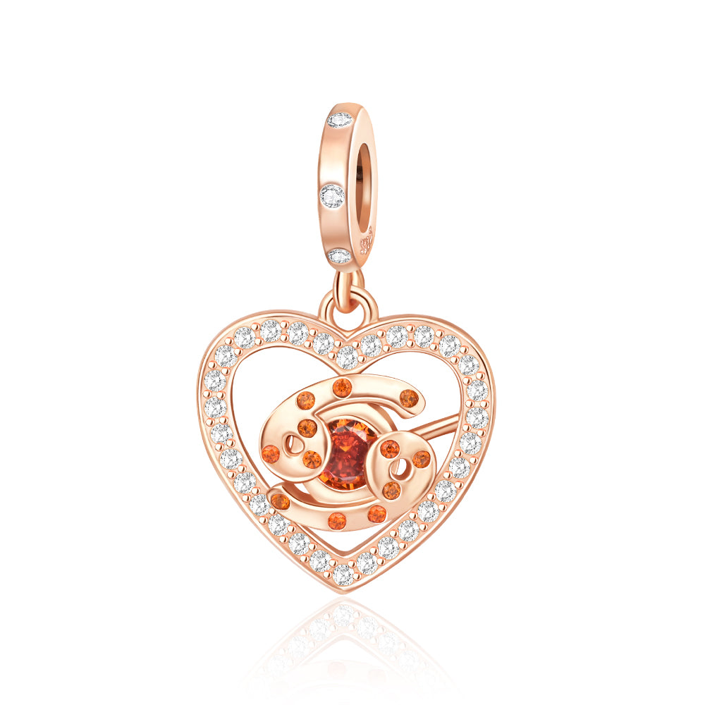 Rose Gold Sparkling Cancer Dangle Charm with clear pavé crystals and orange garnet center stone.