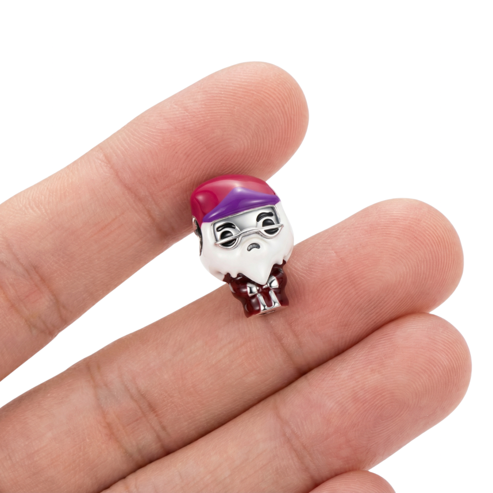 Harry Potter Professor Dumbledore Charm held in a hand, showcasing intricate design and vibrant colors.