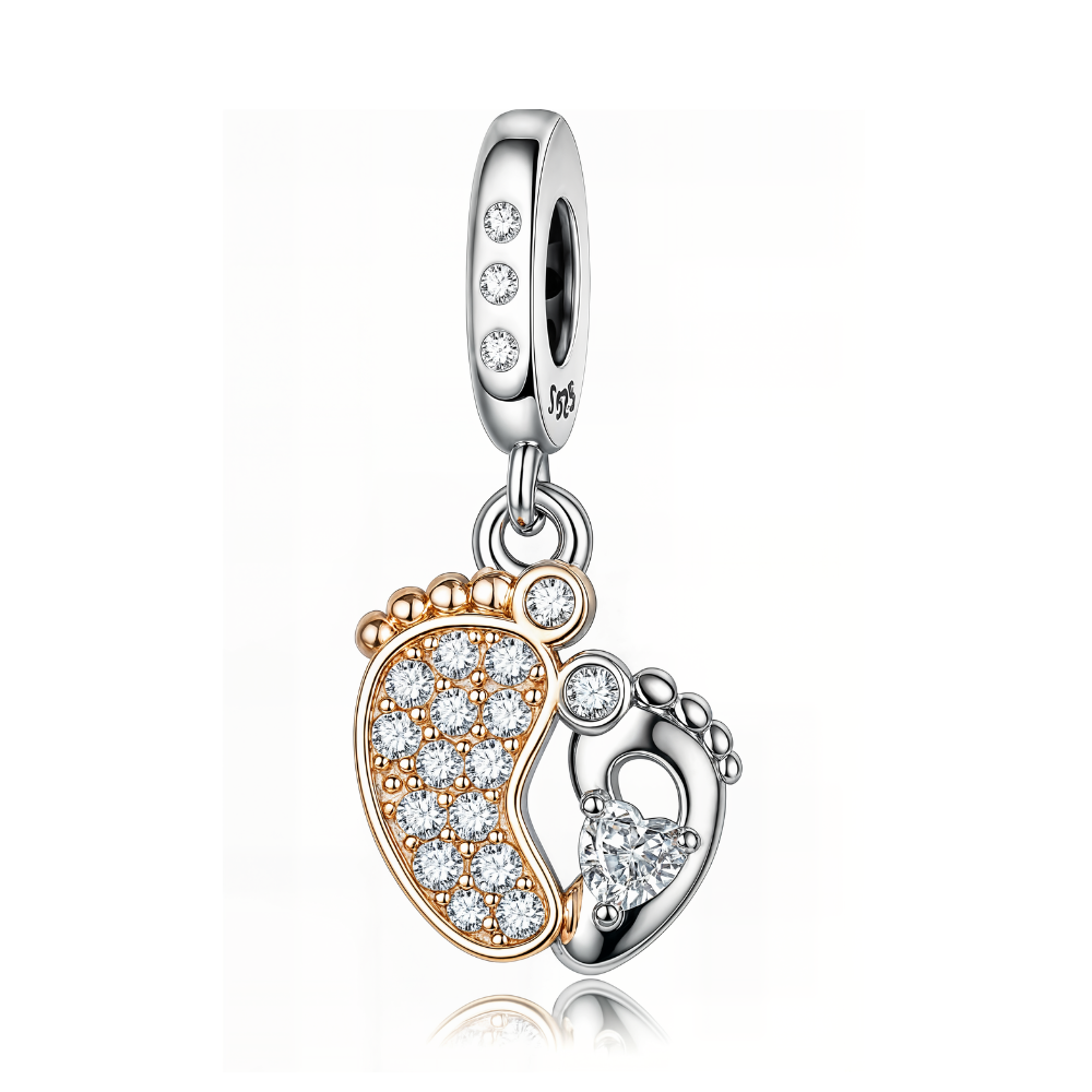 Sparkling Baby Steps Two Tone Dangle Charm with rose gold and silver baby footprints and sparkling heart-cut stone.