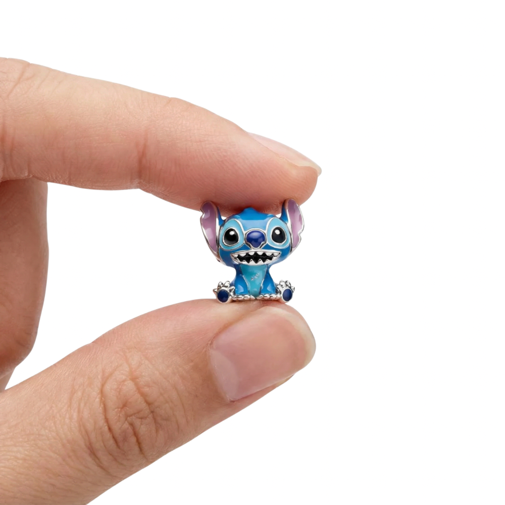 Disney Lilo and Stitch Vibrant Stitch Charm held in a hand, showcasing its playful design and bright colors.
