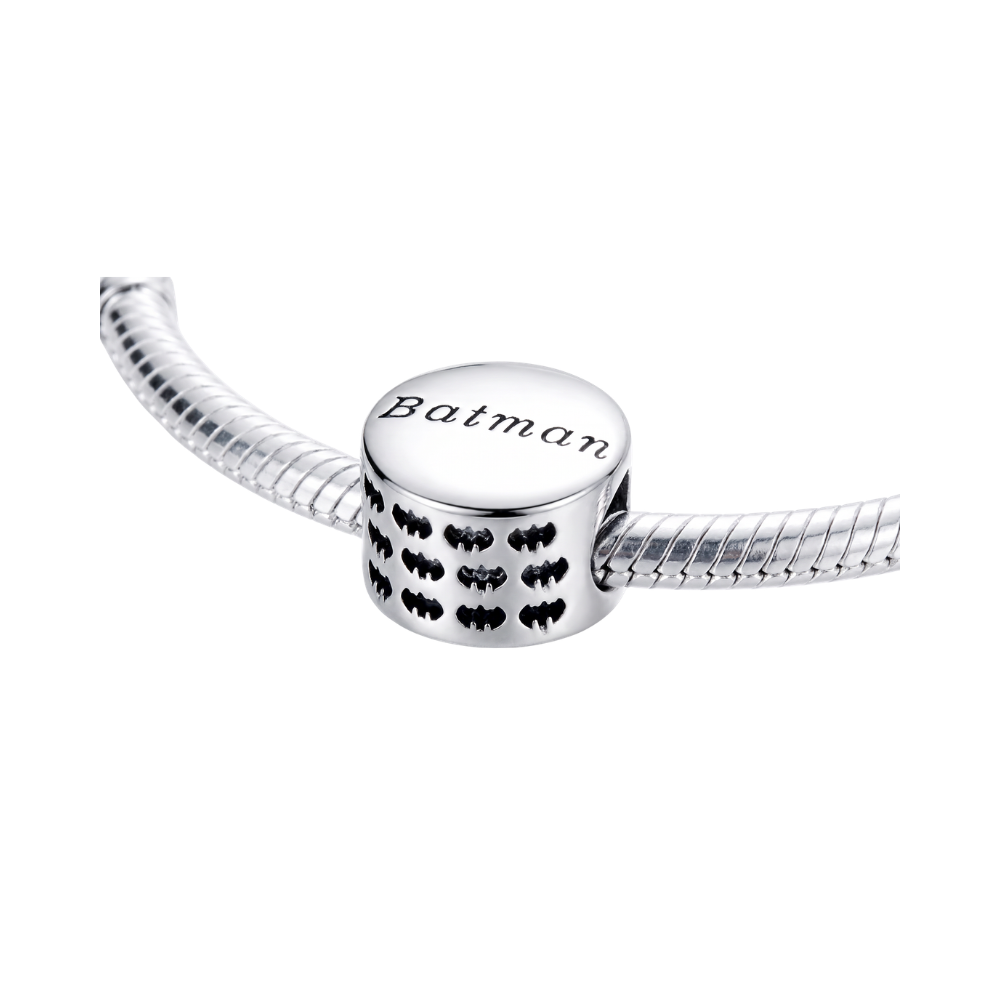 DC Comics Sparkling Batman Logo Charm featuring engraved Batman logo on a silver charm.