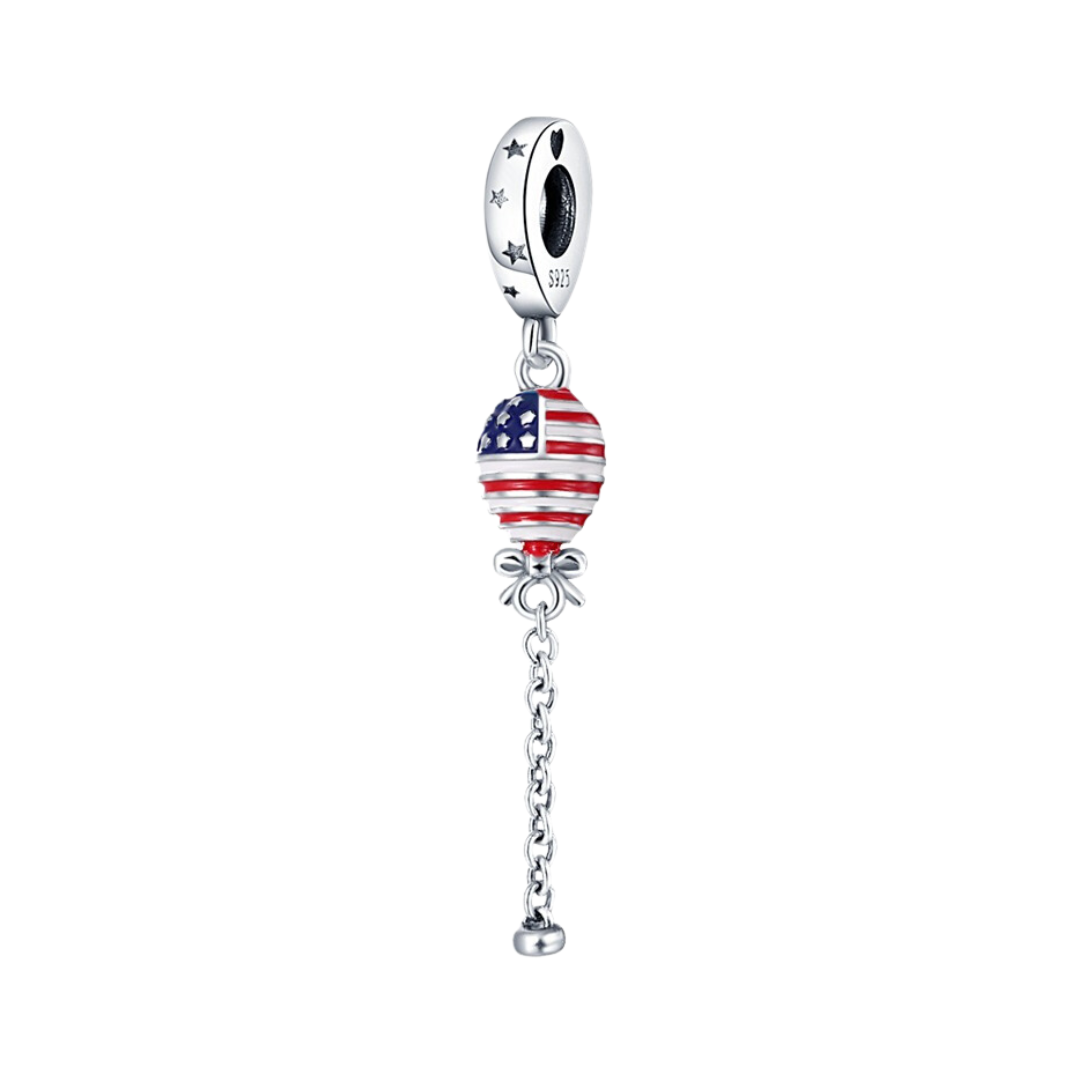 American Flag Balloon Dangle Charm featuring a red, white, and blue balloon on a silver chain with a bow.