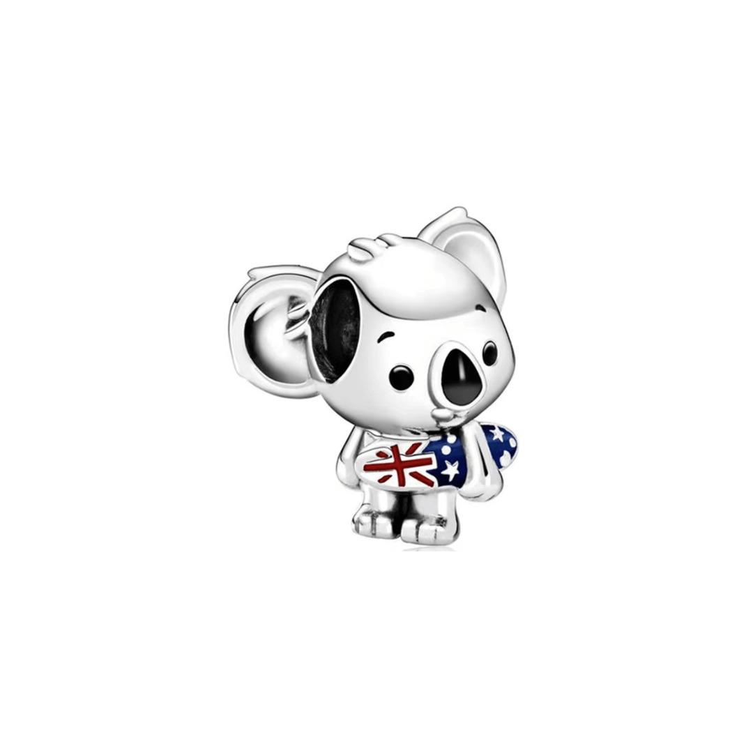 Australian Koala Surfing Charm featuring a silver koala holding an Australian flag surfboard in red, white, and blue.