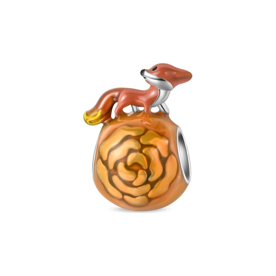 Autumn Fox on Rose Charm featuring an orange fox on a swirling amber rose, perfect for nature lovers.