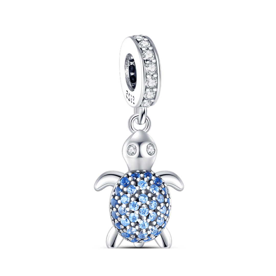 Blue Zircon Turtle Dangle Charm (DISCONTINUED) with blue zircon embellishments, perfect for marine jewelry enthusiasts.
