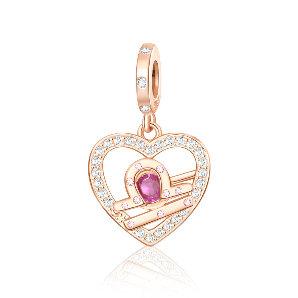 Rose Gold Sparkling Libra Dangle Charm featuring a heart design with pink stones and clear crystals.