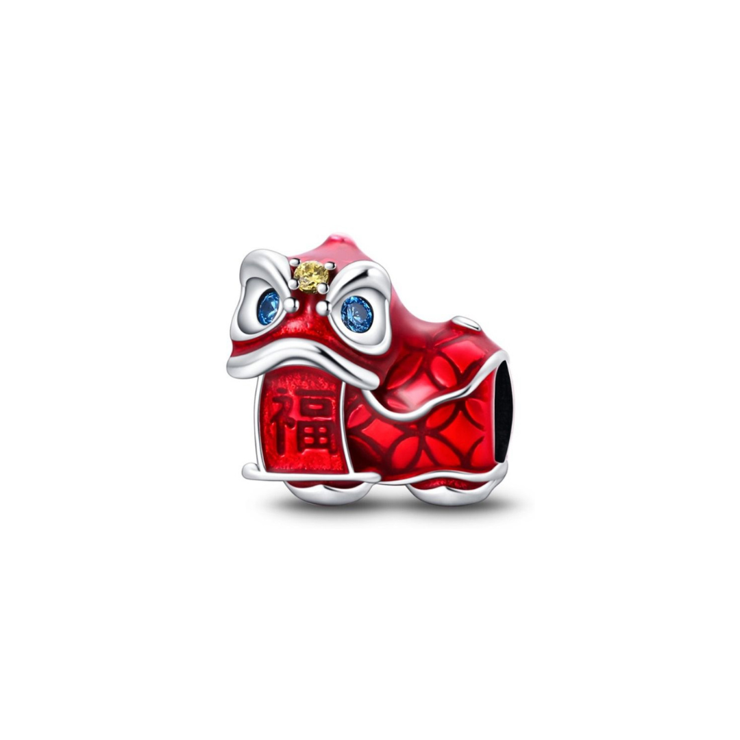 Chinese Lion Dance Fortune Charm in vivid red with blue crystal eyes and 福 character, a symbol of good fortune.