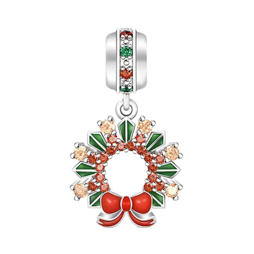 Christmas wreath Dangle Charm ( DISCONTINUED ) with green enamel, radiant stones, and a festive red bow.