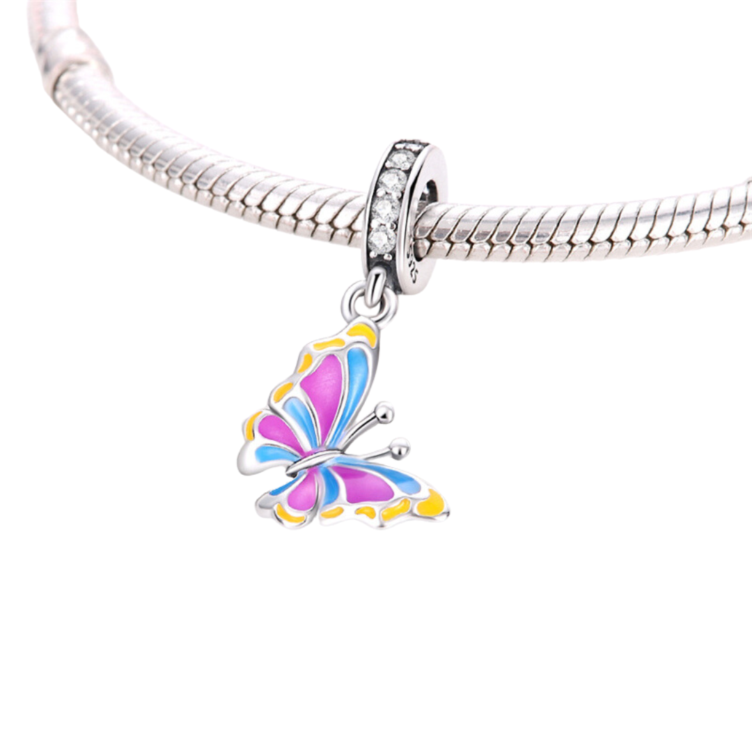 Colour Change Butterfly Dangle Charm featuring multicolour enamel butterfly pendant on silver bracelet.