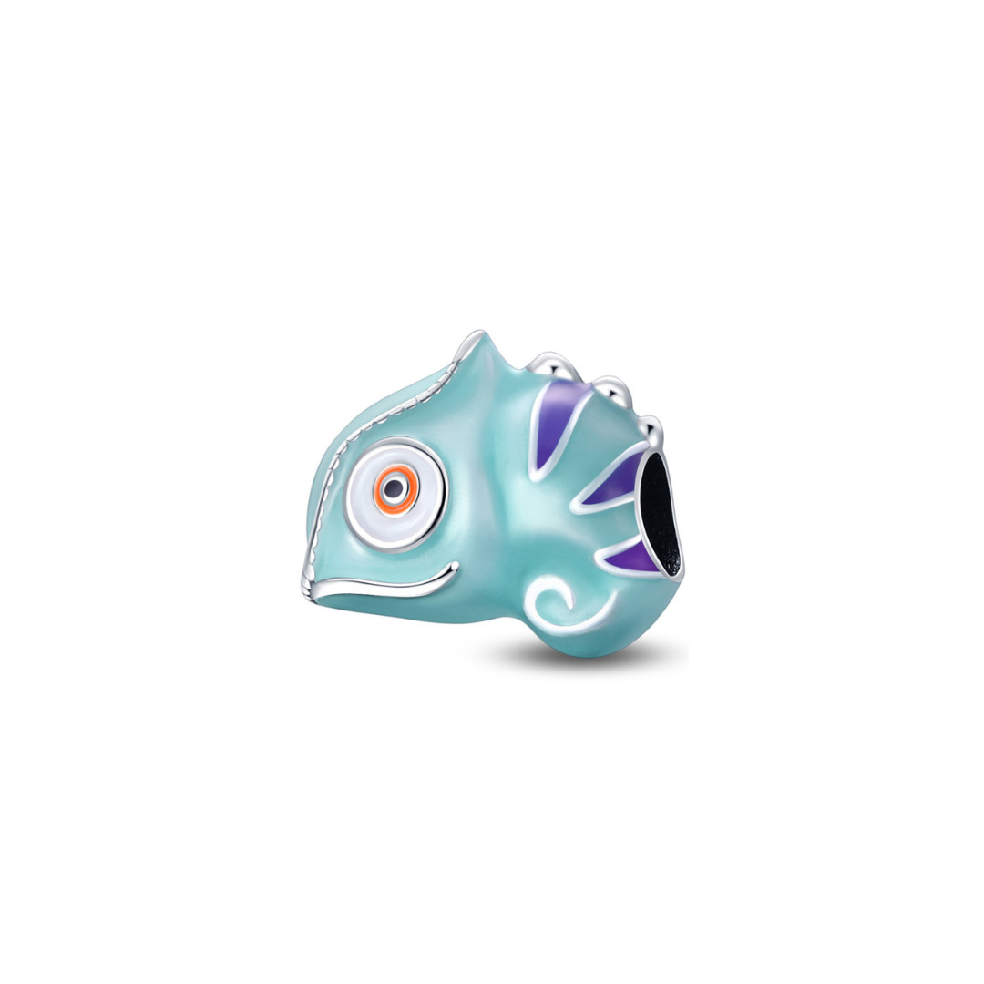 Colour Change Chameleon Charm in soft aqua teal with purple fins and orange eye, showcasing its unique color-changing feature.