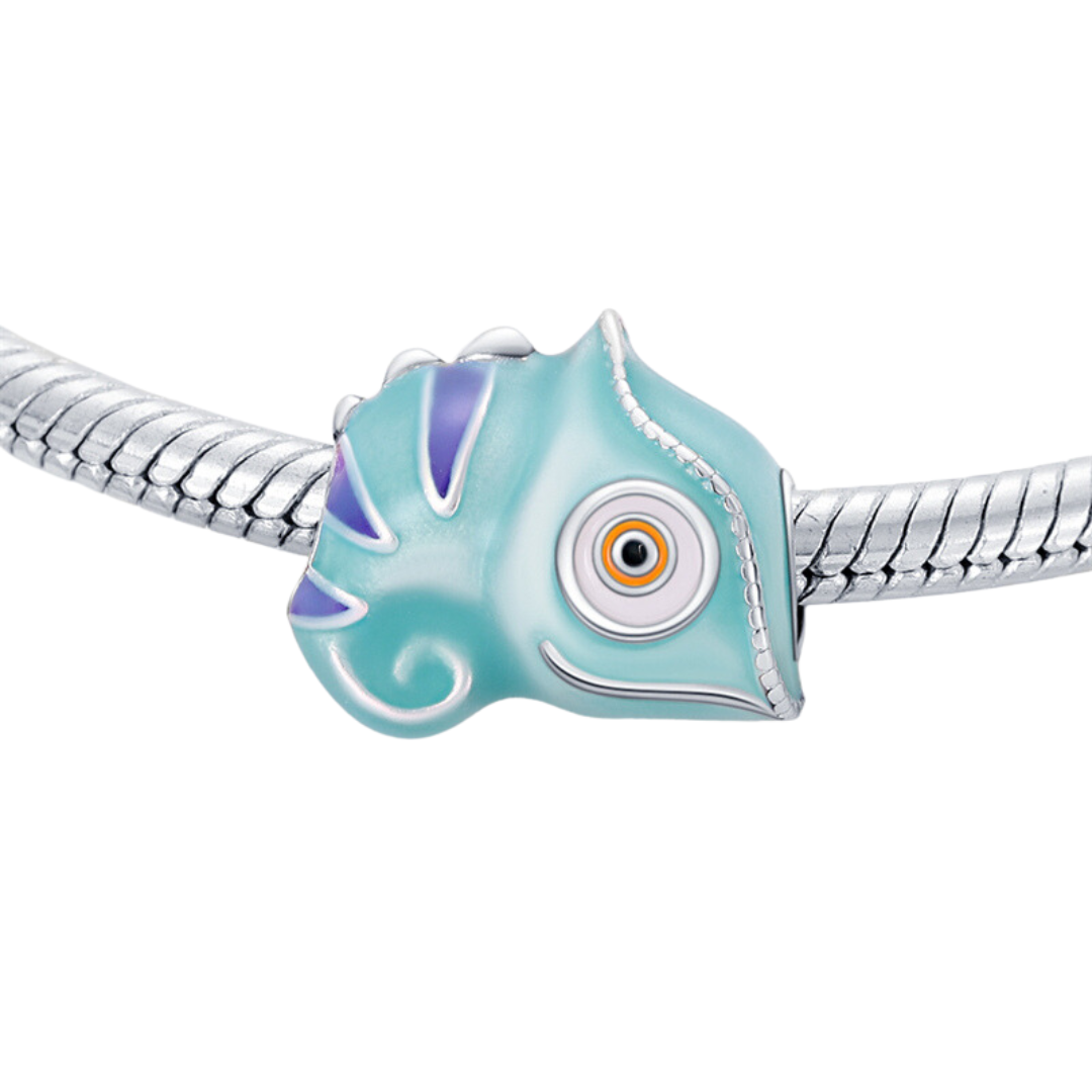 Colour Change Chameleon Charm with soft aqua teal and purple fin detail on a silver bracelet.