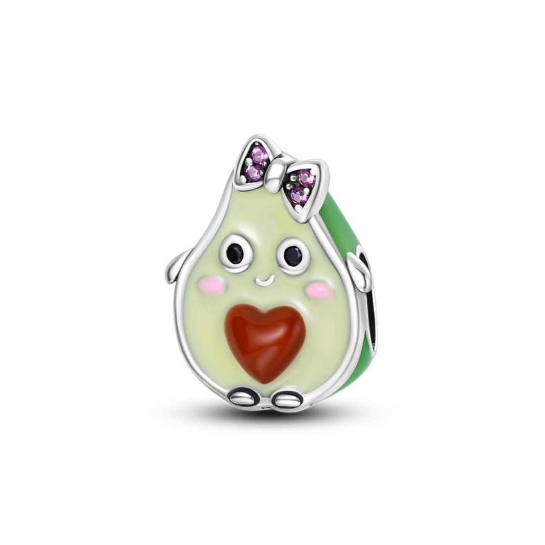 Cute Avocado Charm ( DISCONTINUED ) featuring an adorable smiling face and a pink bow.