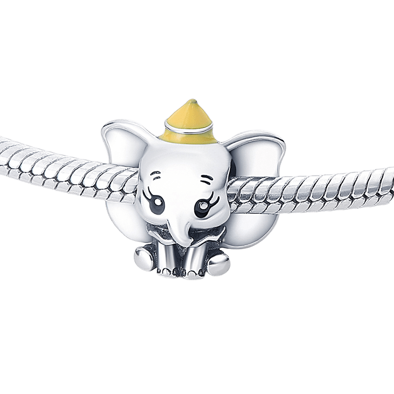 Disney Dumbo Yellow Hat Charm featuring a playful elephant with a yellow hat on a silver bracelet.