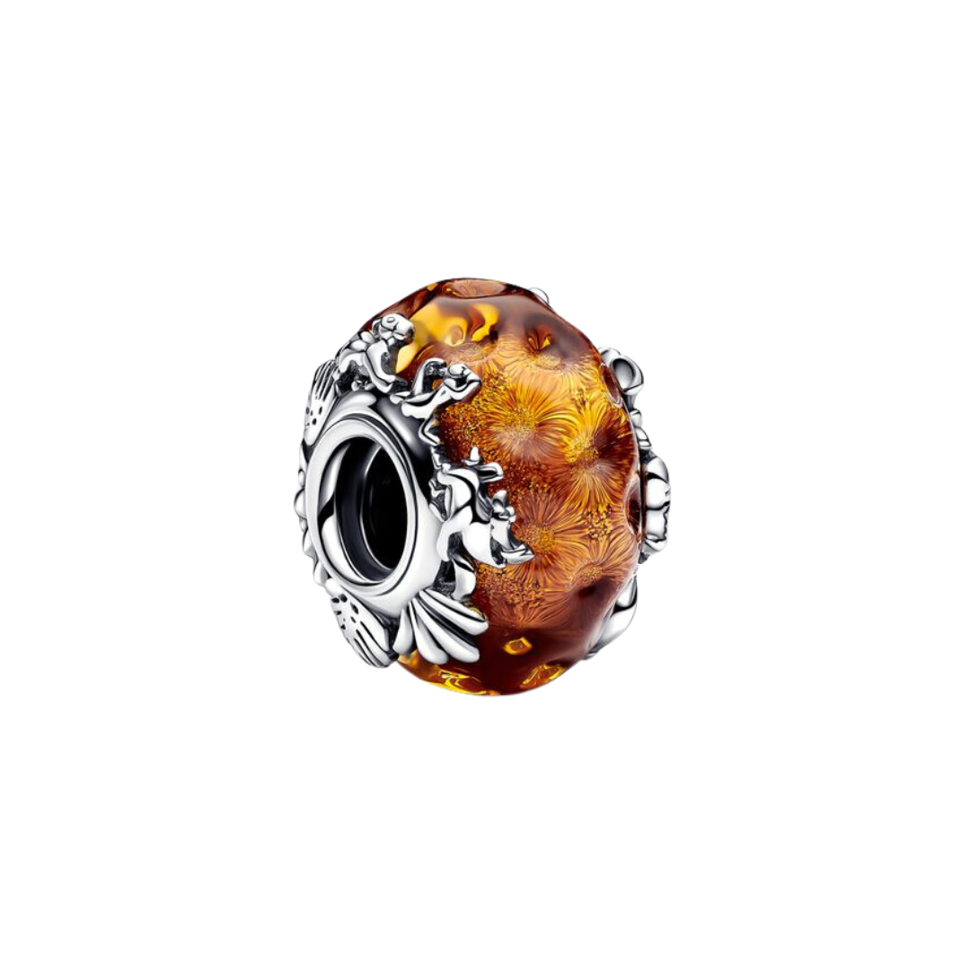 Disney Lion King Murano Glass Charm featuring amber glass and intricate silver lion designs.