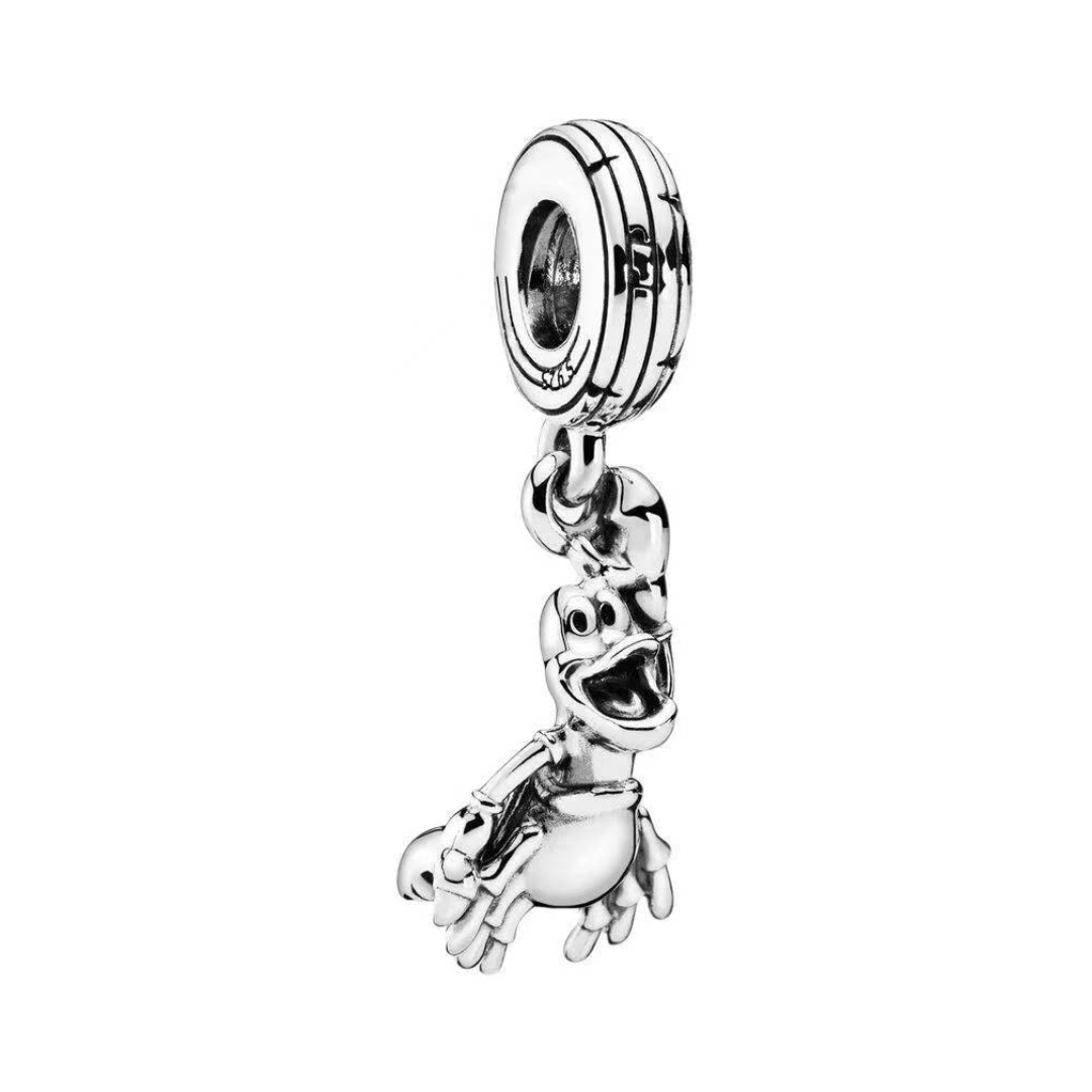 Disney The Little Mermaid Sebastian Dangle Charm in silver features a cheerful design inspired by Sebastian.