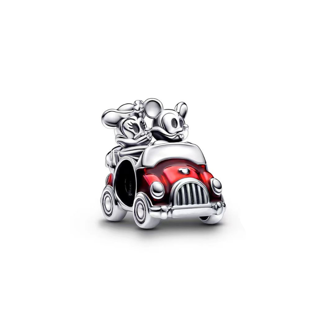 Disney Mickey & Minnie Red Car Charm featuring Mickey and Minnie in a vintage red car.