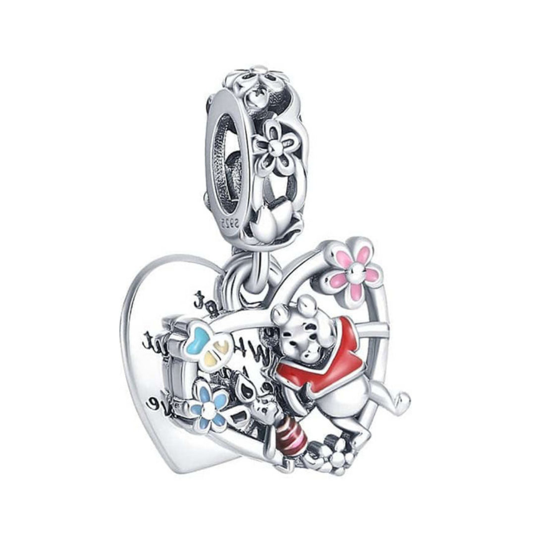 Disney Winnie the Pooh and Piglet Dangle Charm featuring a heart design with flowers and characters.