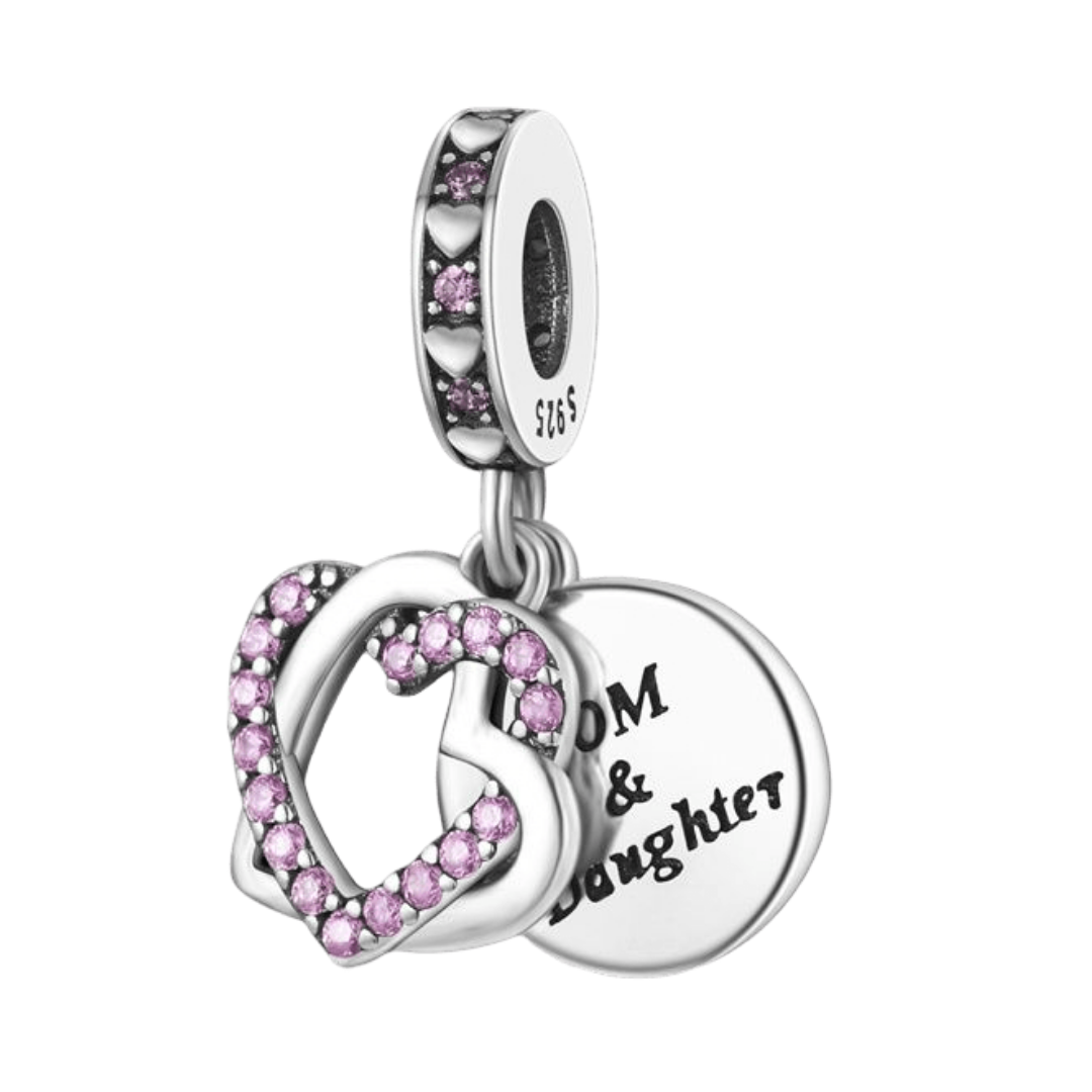 Entwined Mom And Daughter Heart Dangle Charm featuring two hearts and a engraved tag.