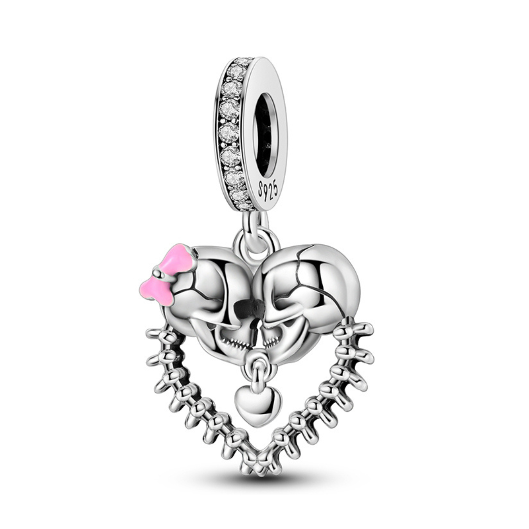 Eternal Love Skull Heart Dangle Charm showcasing a romantic skull design with pink accents and heart details.