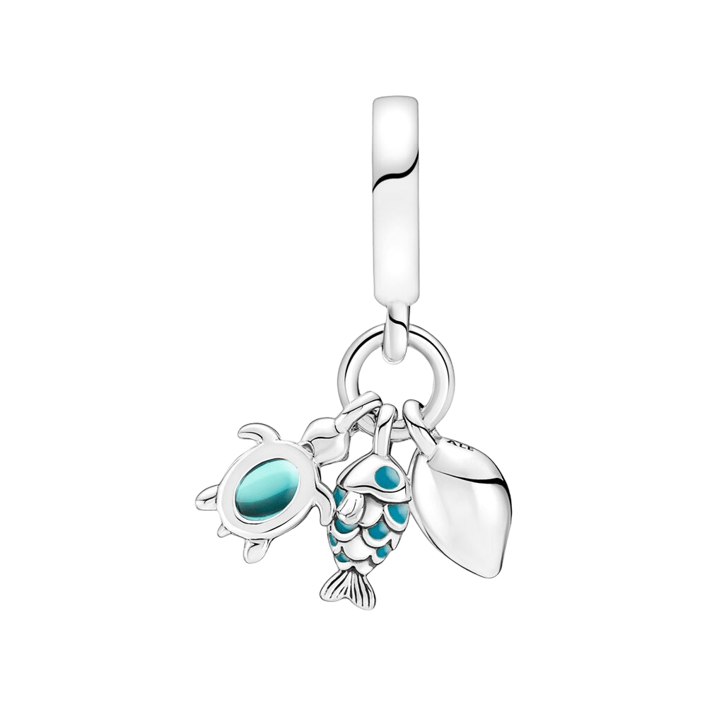 Explore the Ocean Triple Dangle Charm featuring a silver turtle, fish, and cowrie shell.