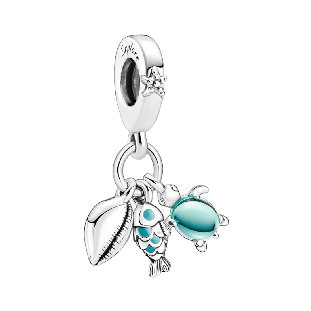 Explore the Ocean Triple Dangle Charm featuring ocean pendants including a cowrie shell, fish, and sea turtle.