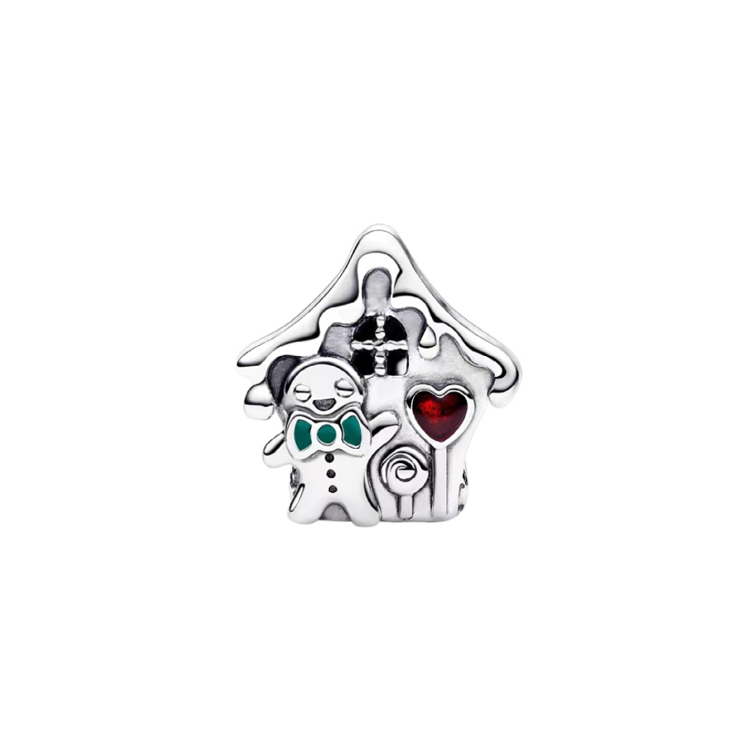 Gingerbread House Christmas Charm featuring a gingerbread man, red heart, and snow-draped roof for festive holiday cheer.