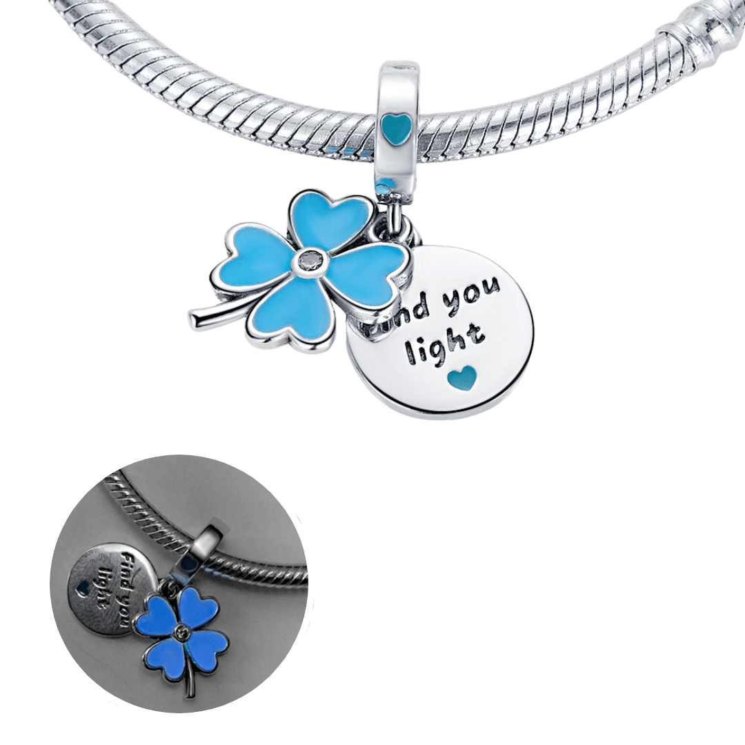 Glow In The Dark Clover Dangle Charm with blue four-leaf clover and engraved find you light disc.