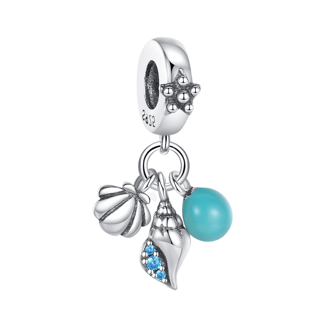 Glow in the Dark Seashell Triple Dangle Charm with silver shells and teal orb, perfect for ocean lovers.