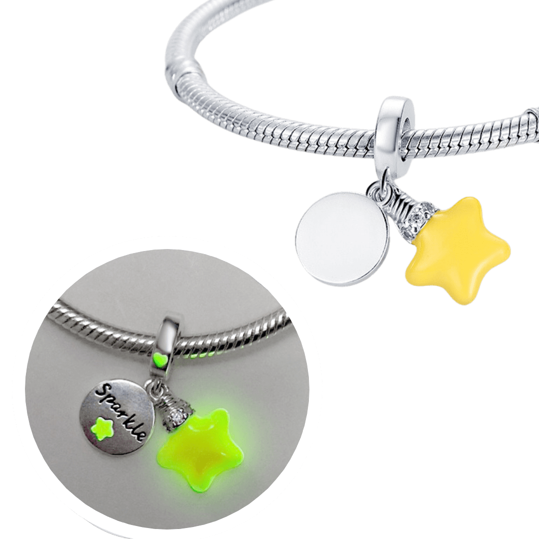 Glow In The Dark Sparkle Star Dangle Charm ( Discontinued) featuring a luminous star and Sparkle tag on a bracelet.