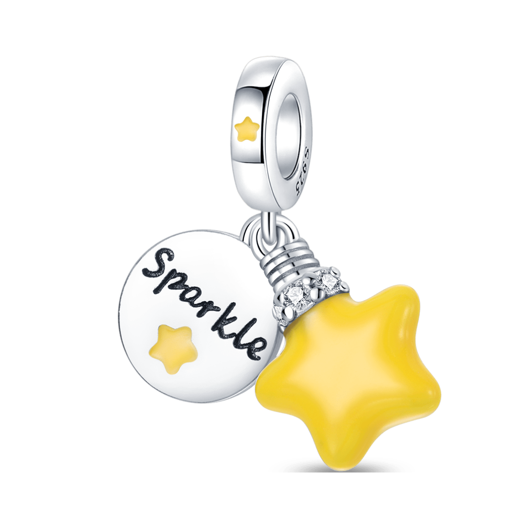 Glow In The Dark Sparkle Star Dangle Charm ( Discontinued) featuring a yellow star and 'Sparkle' tag in sterling silver.