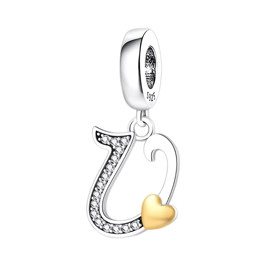 Gold Heart Alphabet Dangle Charm A–Z (DISCONTINUED) silver letter U charm with golden heart and sparkling accents.