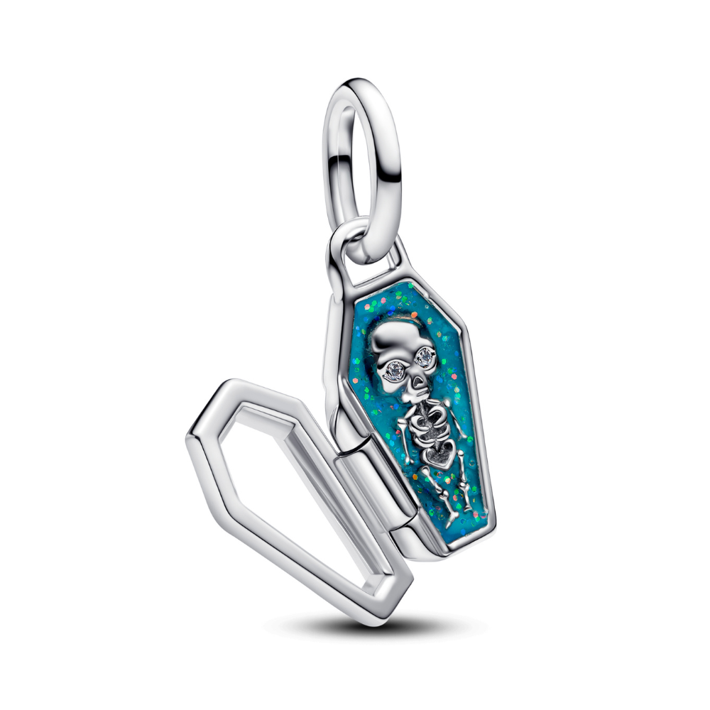 Opening Coffin Skeleton Pendant featuring a silver coffin that opens to reveal a skeleton against teal glitter opal.