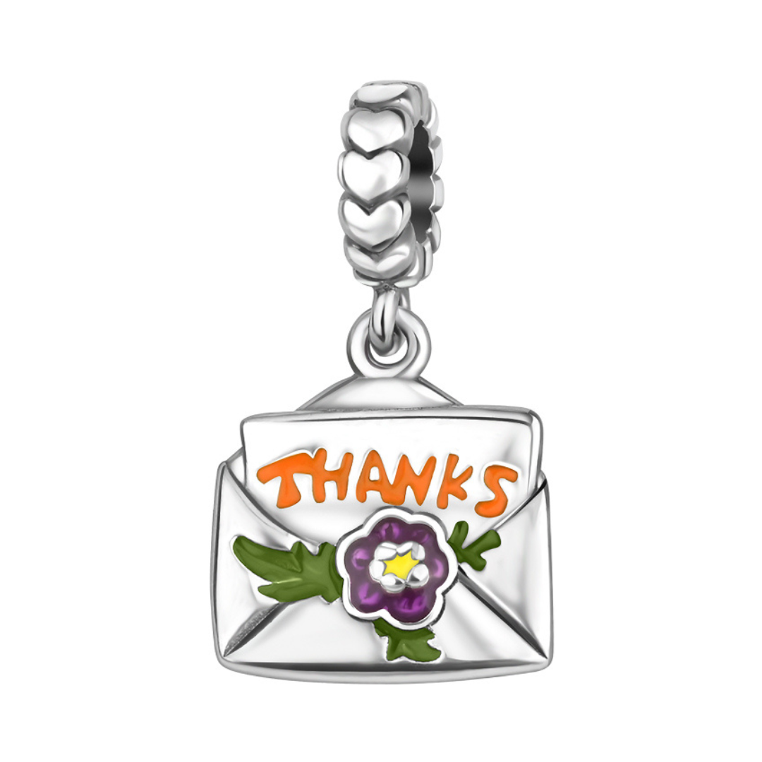Grateful Heart Thanks Envelope Dangle Charm featuring an open envelope with orange "THANKS" and a purple flower.