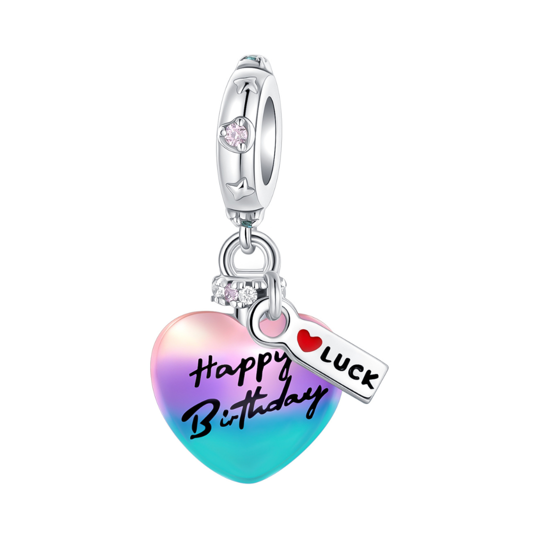 Happy Birthday Heart Dangle Charm featuring a colorful heart and a tag saying 'Luck'.