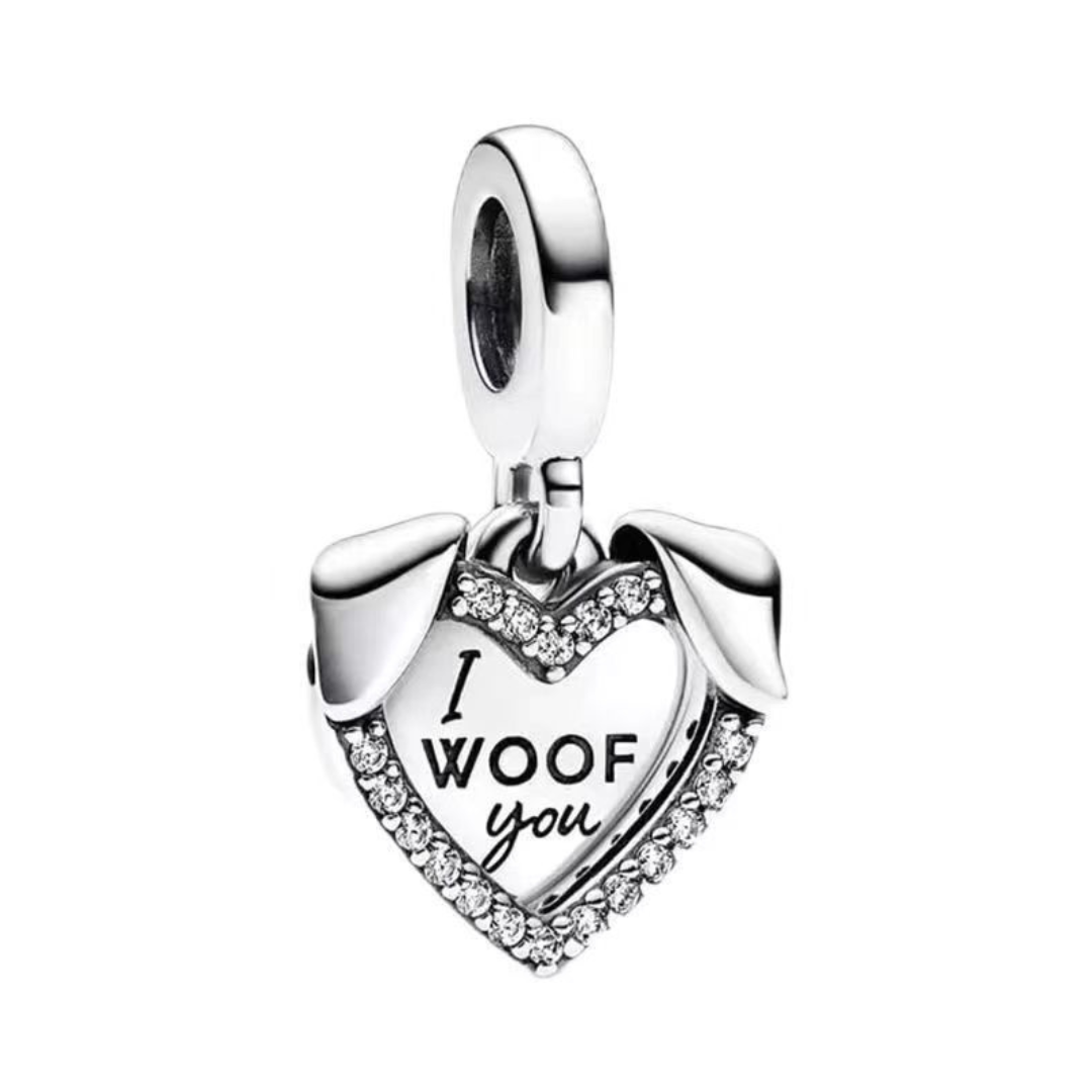 I Woof You Dog Heart Dangle Charm with silver heart and dog ears, bordered with pavé crystals.
