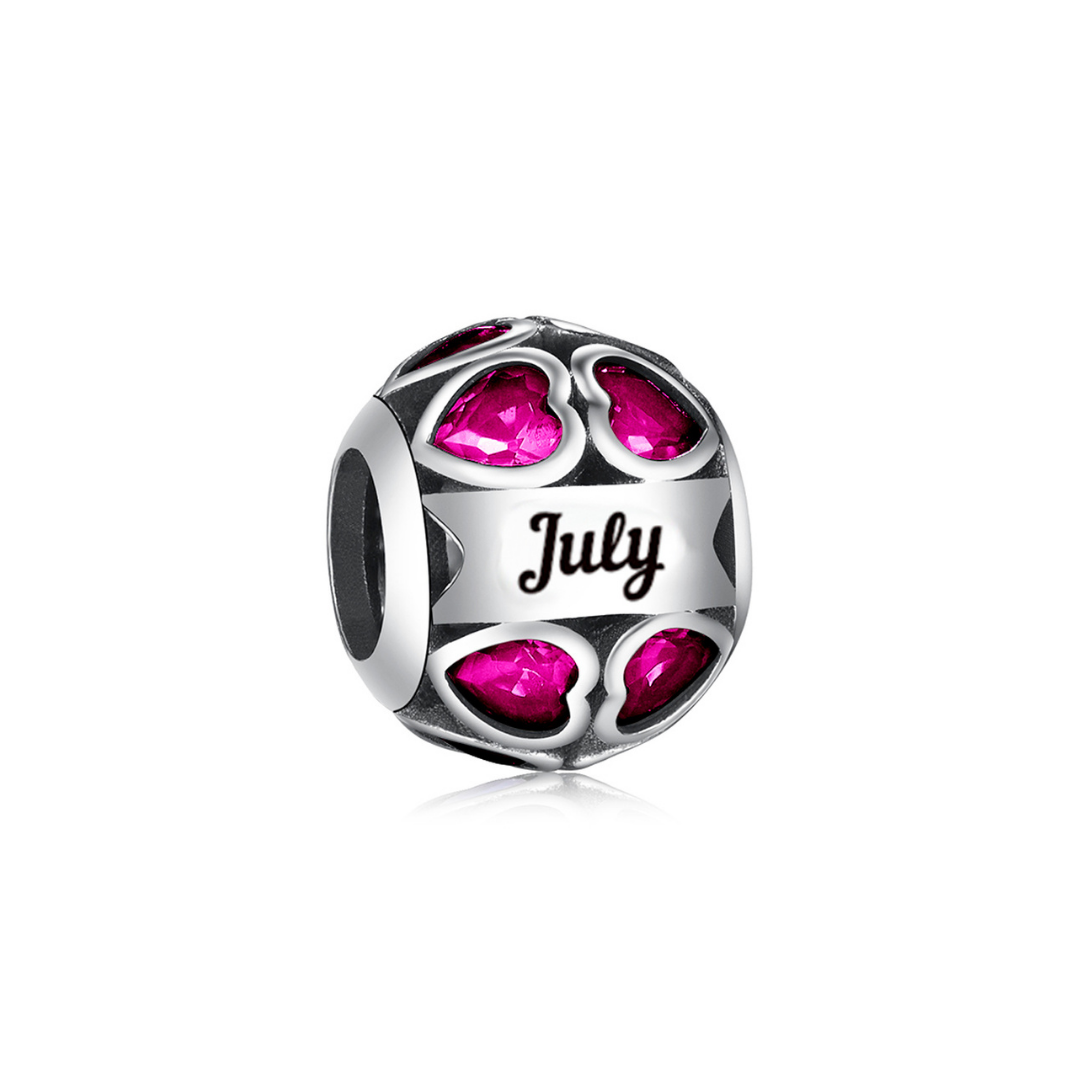July Birthstone Heart Charm featuring vibrant pink crystals and a 'July' engraved plaque.