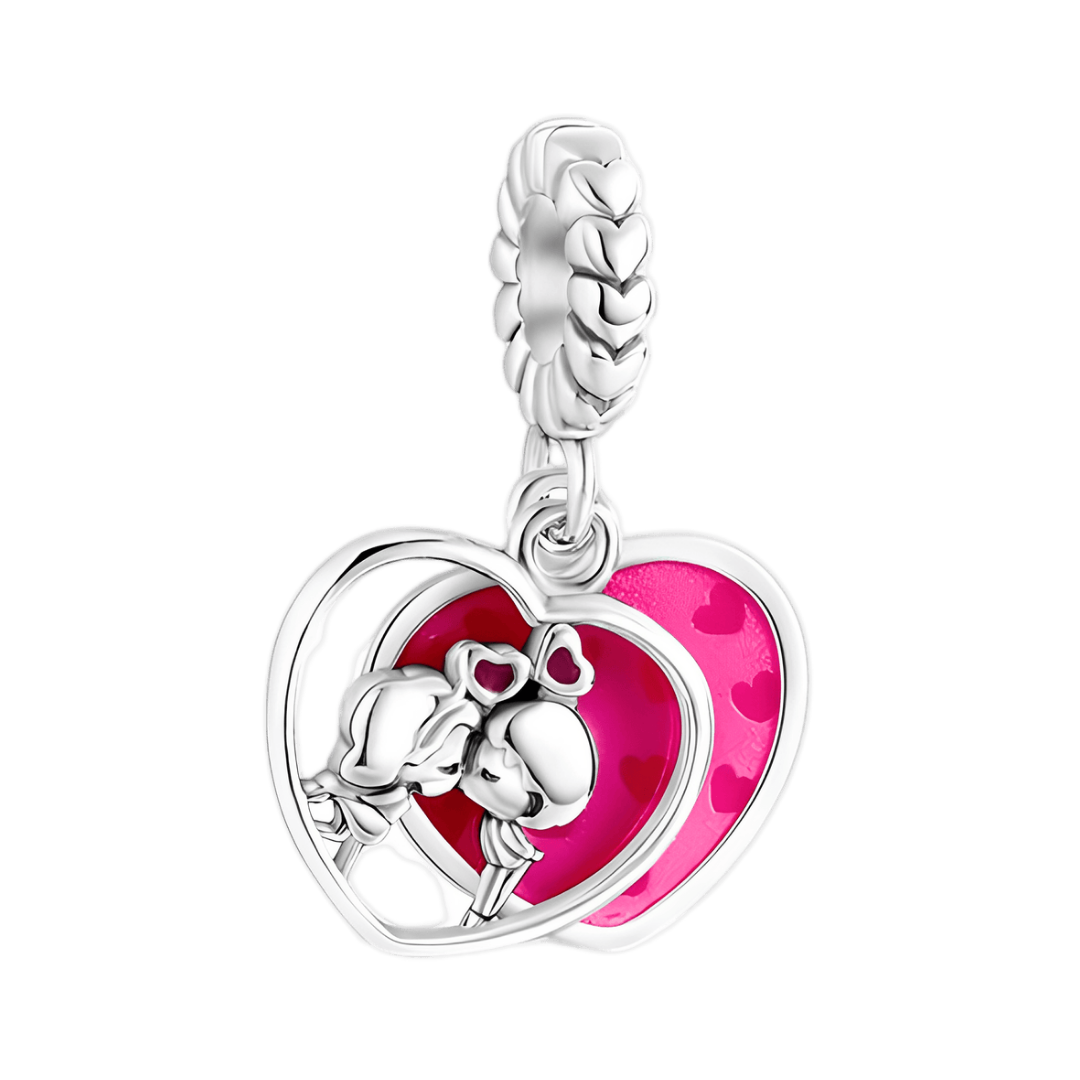 Kissing Couple Double Heart Dangle Charm featuring lovebirds and stacked enamel hearts in magenta and pink.