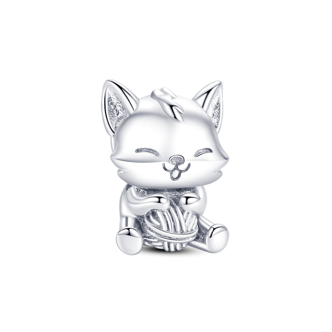 Adorable Kitten And Yarn Ball Charm showing a charming kitten with a ball of yarn, perfect for cat lovers.
