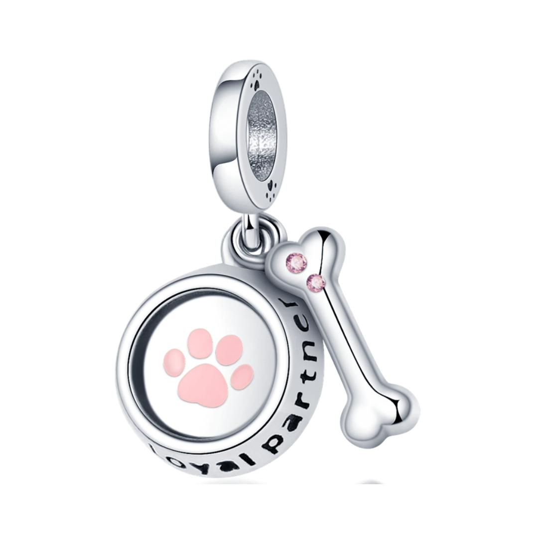 Loyal Partner Paw Print Dangle Charm featuring a pink paw print and a small bone with pink stones.