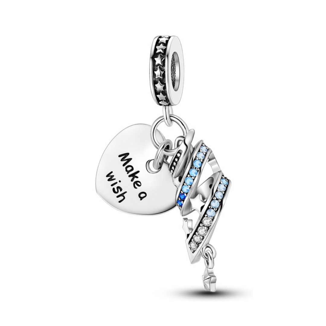 Make a Wish Shooting Star Dangle Charm ( Discontinued) with a heart-shaped charm and sparkling details.