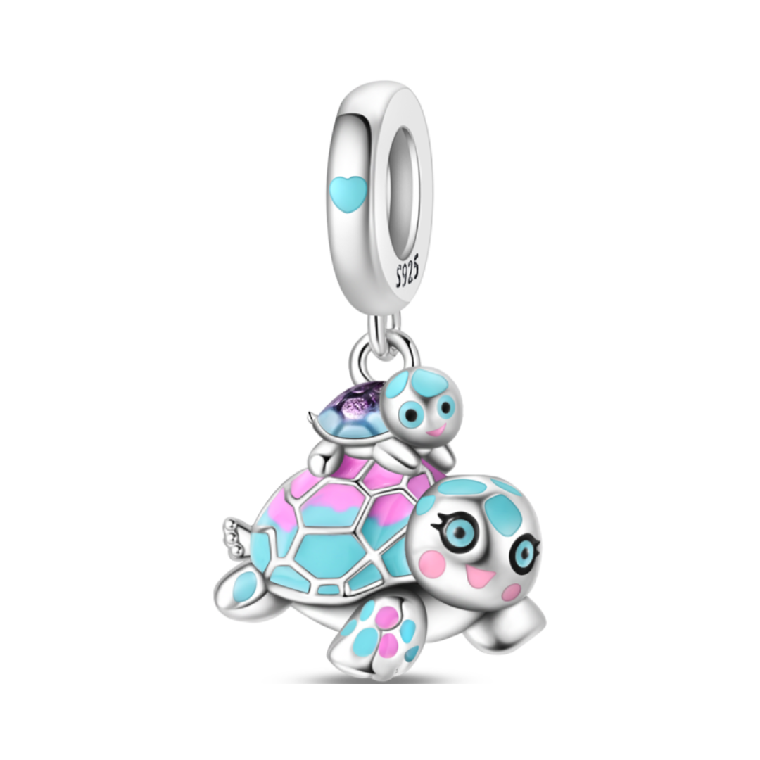 Mama Turtle & Baby Dangle Charm featuring a pink and teal enamel turtle with a baby on its shell.