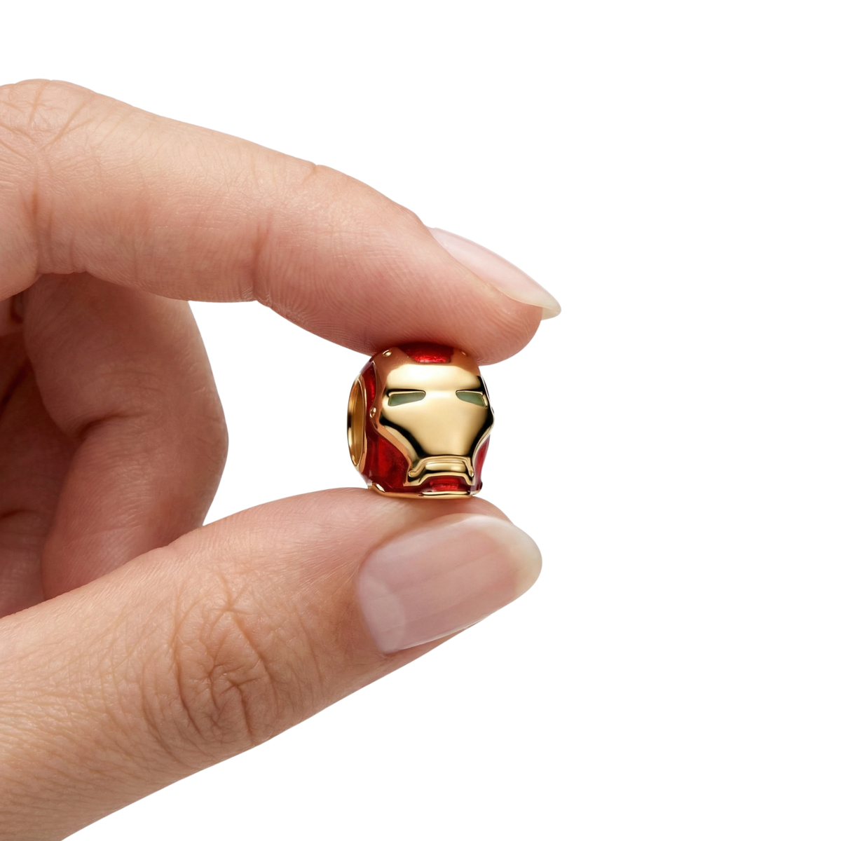 Marvel Iron Man Helmet Charm held between fingers, showcasing the sleek superhero design.